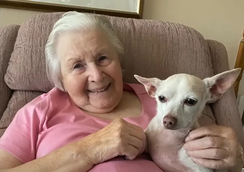 a 100-Year-Old Woman adopted an old dog